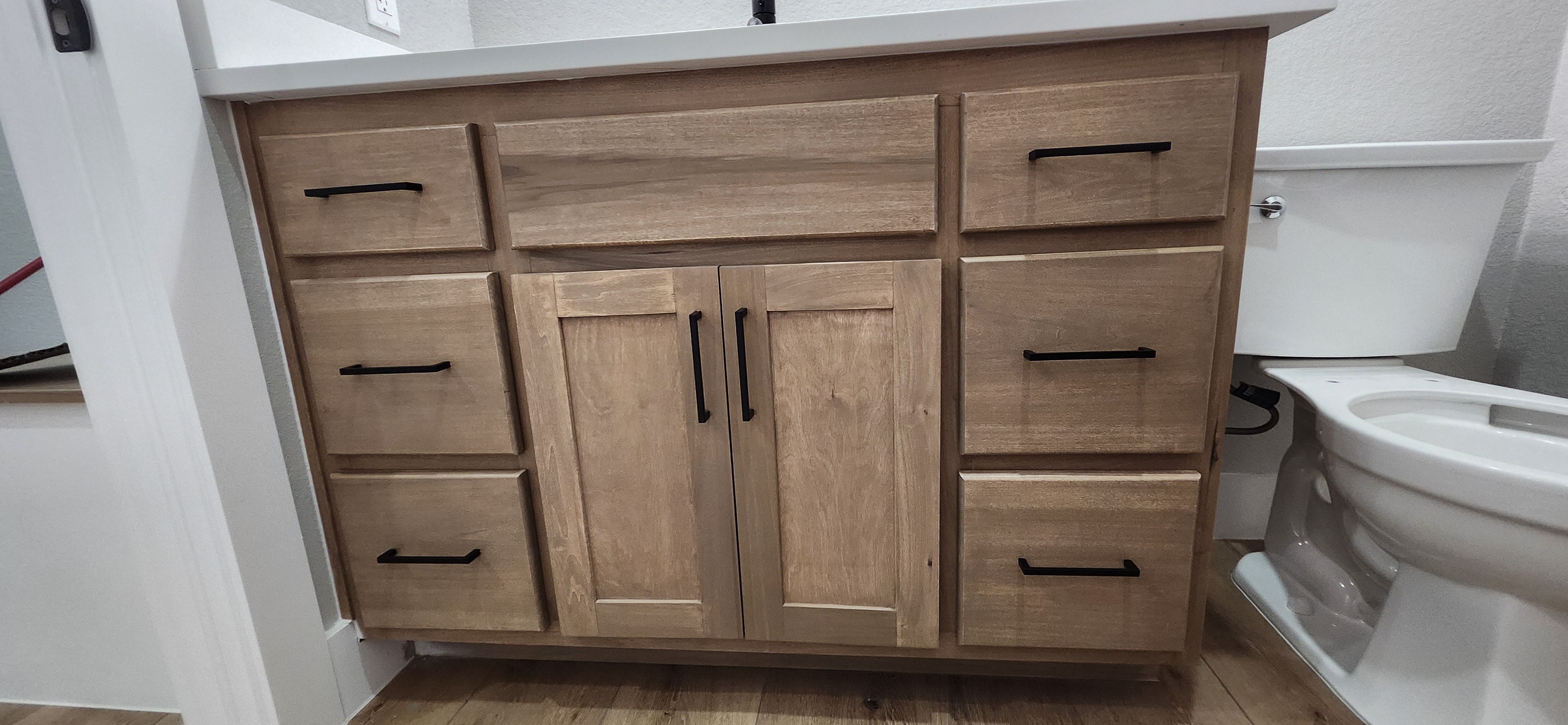 Custom bathroom vanity front detail wood shaker doors