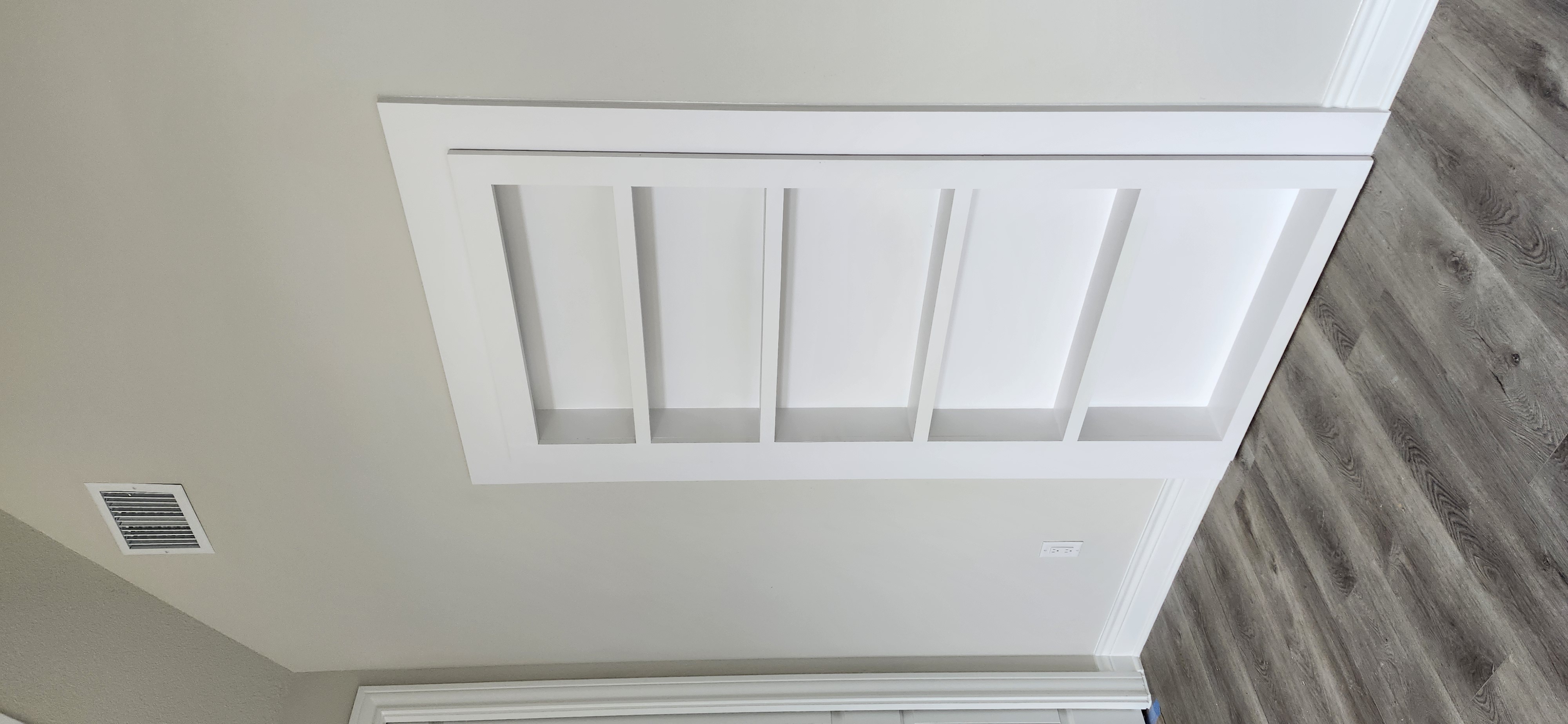 Hidden bookcase door closed — looks like built-in bookshelf