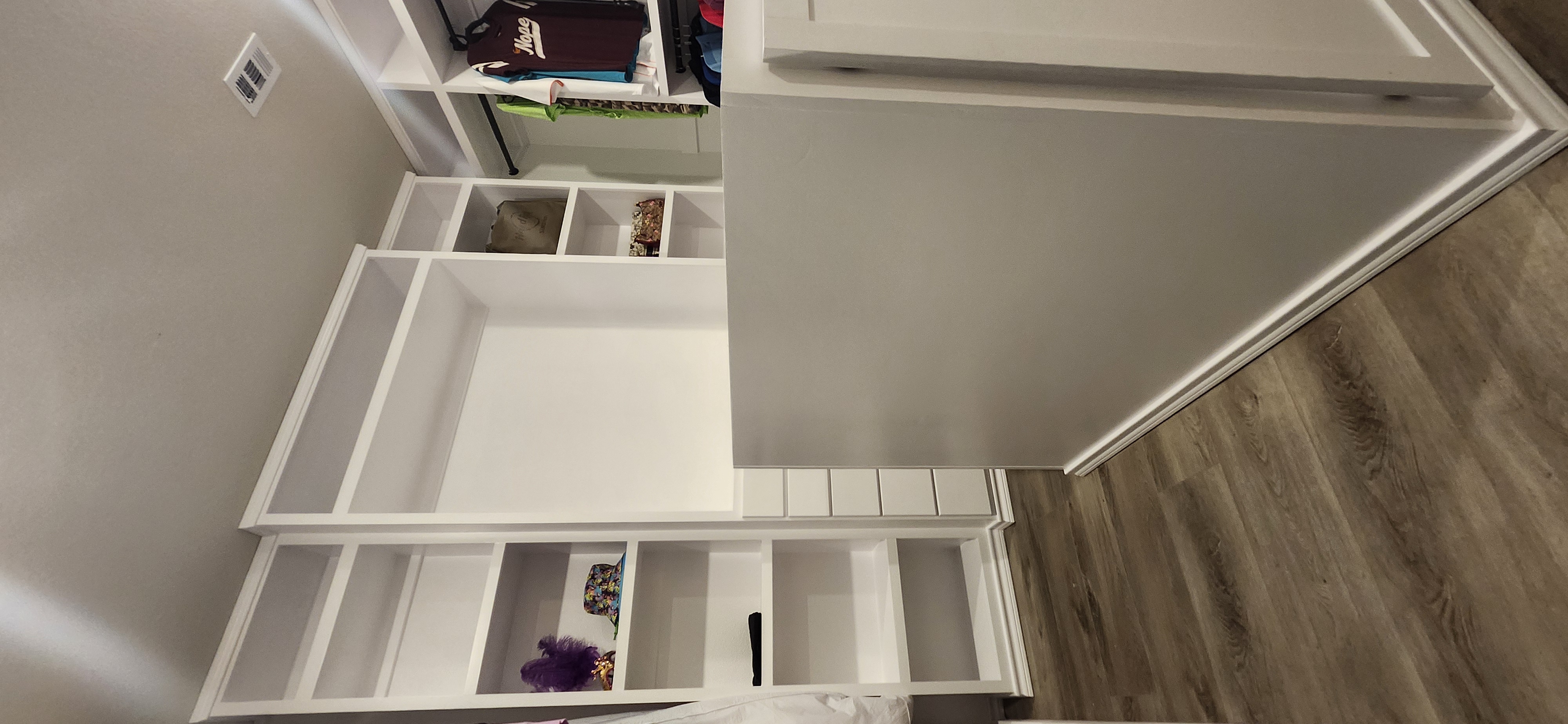 Custom closet island overview hers side shelving drawers