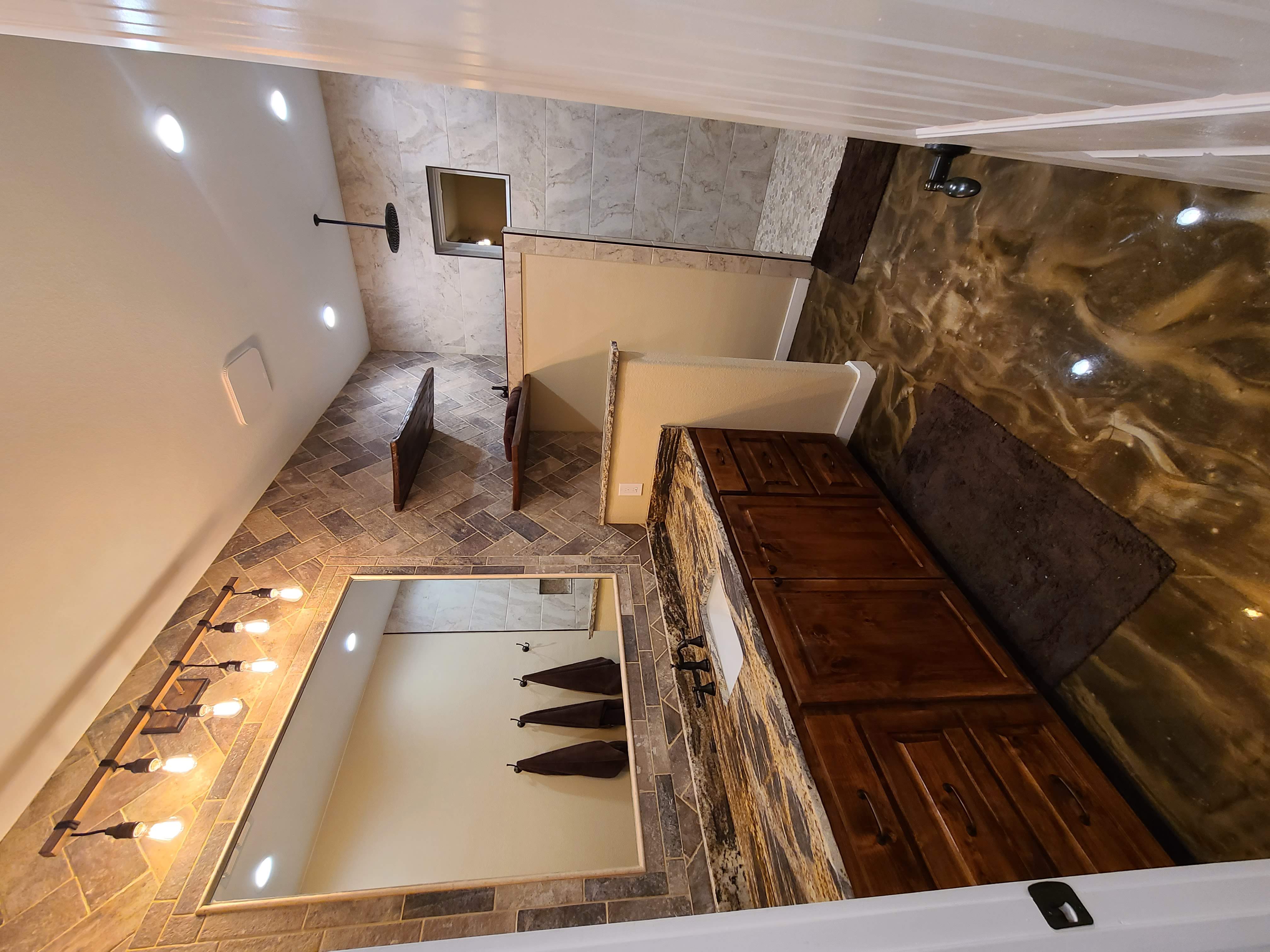 Master bathroom diamond tile accent wall walk-in rain shower epoxy floor